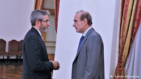Enrique Mora, the European Union coordinator of talks to revive Iran's nuclear accord with world powers shakes hands with Iran's top nuclear negotiator Ali Bagheri Kani, in Tehran, Iran