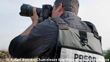 Professioneller Photojournalist, Kriegsberichterstattung