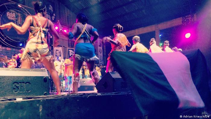 Women dancing on a stage at the New Afrika Shrine