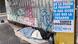 Una persona indigente duerme en una acera de Buenos Aires Una persona indigente duerme en una acera de Buenos Aires