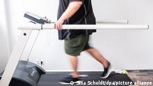 Overwheight man on treadmill