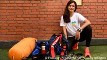 In this picture taken on April 13, 2022, Ukraine's mountaineer Antonina Samoilova poses for picture with her equipment before an interview with AFP in Kathmandu. - A Ukrainian climber said on April 13 she will summit Mount Everest carrying her national flag to rally global support for her country and boost morale among those fighting the Russian invasion. (Photo by PRAKASH MATHEMA / AFP) (Photo by PRAKASH MATHEMA/AFP via Getty Images)