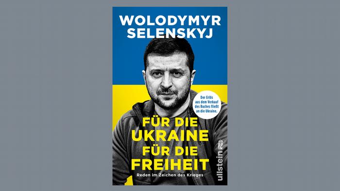 The cover of the book For Ukraine - For Freedom shows Volodymyr Selenskyj against a blue and yellow background
