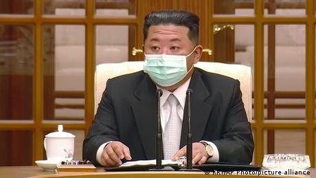 Kim Jong Un wearing a mask