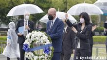 European Council President Charles Michel offers a wreath to the cenotaph for the victims of the 1945 atomic bombing, at Peace Memorial Park in Hiroshima, western Japan May 13, 2022, in this photo taken by Kyodo. Mandatory credit Kyodo/via REUTERS ATTENTION EDITORS - THIS IMAGE WAS PROVIDED BY A THIRD PARTY. MANDATORY CREDIT. JAPAN OUT. NO COMMERCIAL OR EDITORIAL SALES IN JAPAN. 