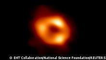This is the first image of Sagittarius A* (or Sgr A* for short), the supermassive black hole at the center of our galaxy. It was captured by the Event Horizon Telescope (EHT), an array which linked together radio observatories across the planet to form a single Earth-sized virtual telescope. The new view captures light bent by the powerful gravity of the black hole, which is four million times more massive than our Sun. EHT Collaboration/National Science Foundation/Handout via REUTERS 