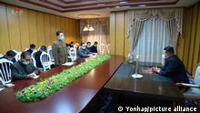North Korean leader Kim Jong-un (R) at the State Emergency Epidemic Prevention Headquarters in Pyongyang.