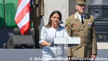 Hungarian President Katalin Novak, left, delivers her speech during her official inauguration ceremony in front of the Parliament in Budapest, Hungary, Saturday, May 14, 2022. From right Major General Istvan Kun Szabo is seen. (Szilard Koszticsak/MTI via AP)