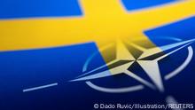 FILE PHOTO: Swedish and NATO flags are seen printed on paper this illustration taken April 13, 2022. REUTERS/Dado Ruvic/Illustration/File Photo