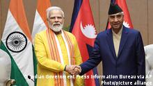 16.05.2022 *** In this photograph released by Indian government's Press Information Bureau, Indian Prime Minister Narendra Modi, left and his Nepalese counterpart Sher Bahadur Deuba, pose or photographs during their bilateral meeting in Lumbini, Nepal, Monday, May 16, 2022. (Press Information Bureau via AP)