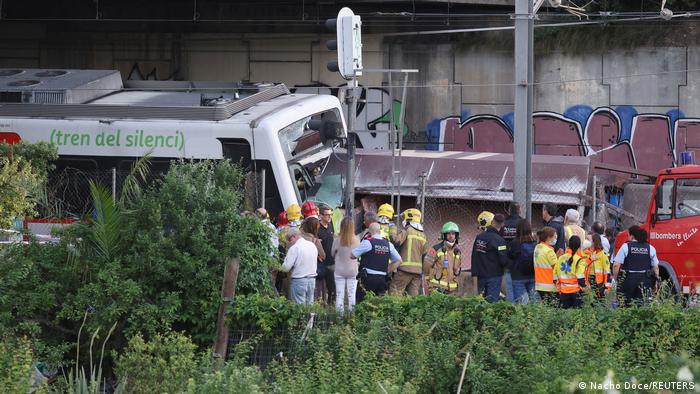 First responders attend the scene of the crash in Sant Boi de Llobregat