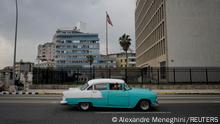 30.10.2020
FILE PHOTO: A vintage car passes by the U.S. Embassy in Havana, Cuba, October 30, 2020. Picture taken October 30, 2020. REUTERS/Alexandre Meneghini/File Photo