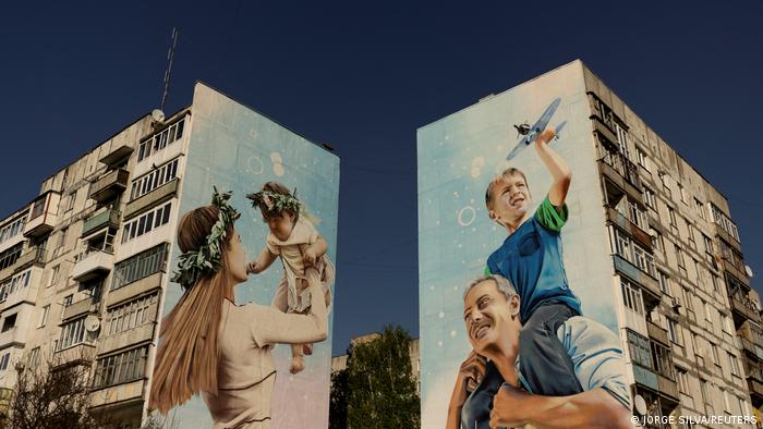 Large murals on the facades of apartment buildings in Bakhmut, Ukraine