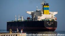 Flying a Greek flag, crude oil tanker New Hellas leaves the port after unloading at a refinery in Havana, Cuba, Wednesday, June 27, 2018. (AP Photo/Desmond Boylan)