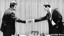 Feb. 10, 2011 - Russian chess master Boris Spassky, left, shakes hands with Bobby Fischer at the Laugardalsholl Hall in Reykjavik, Iceland, July 11, 1972. Spassky made the first move before Fischer arrived. - ZUMAm42_