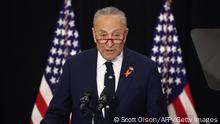 BUFFALO, NEW YORK - MAY 17: U.S. Senator Chuck Schumer (D-NY) speaks to guests during an event with US President Joe Biden and several family members of victims of the Tops market shooting at the Delavan Grider Community Center on May 17, 2022 in Buffalo, New York. Biden along with first lady Dr. Jill Biden placed flowers at a memorial outside of the market and met with family members of victims during their visit to the city. A gunman opened fire Saturday at the store killing ten people and wounding another three. The attack was believed to be motivated by racial hatred. Scott Olson/Getty Images/AFP
== FOR NEWSPAPERS, INTERNET, TELCOS & TELEVISION USE ONLY ==