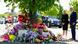 Biden and his wife, Jill Biden, stand by a a makeshift memorial outside the supermarket where the shooting took place Biden and his wife, Jill Biden, stand by a a makeshift memorial outside the supermarket where the shooting took place