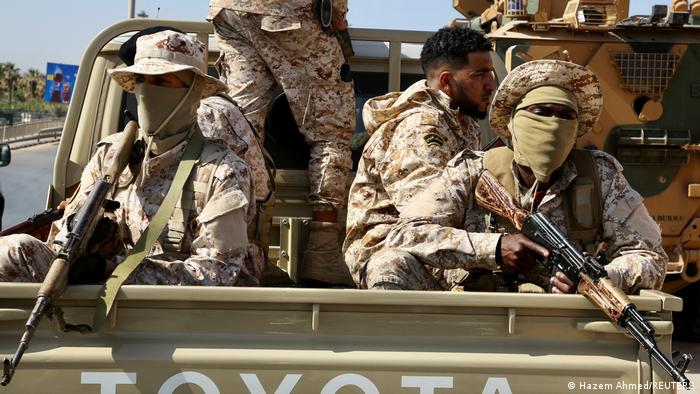 Soldiers loyal to Libya's Tripoli-based government in the back of a truck