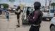 Police officers patrol a street during an anti-gang operation north of Port-au-Prince, Haiti, Thursday, April 28, 2022 Police officers patrol a street during an anti-gang operation north of Port-au-Prince, Haiti, Thursday, April 28, 2022