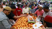 On the day of Muslim fasting month of Ramadan, Bangladeshi vendors sell Iftar in Dhaka, Bangladesh, on April 21, 2022.