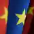 Close-up of EU and Chinese flags