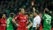 Referee shows a player a red card Referee shows a player a red card