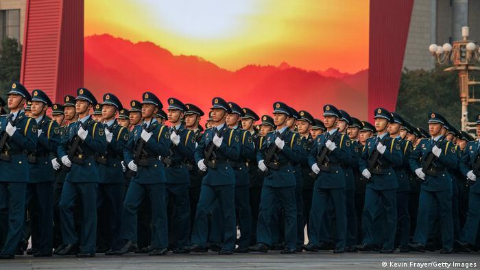 Chinese military march in in formation as they do a last rehearsal before a parade to celebrate the 70th Anniversary of the founding of the People's Republic of China