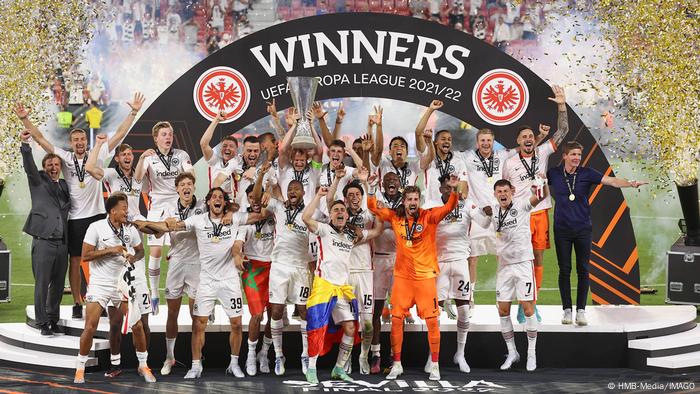 Eintracht Frankfurt players lift the Europa League trophy