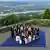 The G7 finance ministers pose on Petersberg above the Rhine river