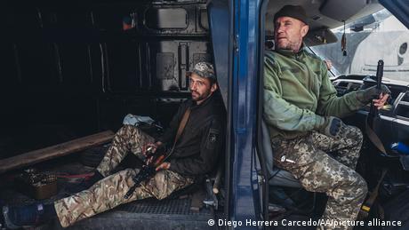 Ukrainian soldiers moving to the frontline in the Donbas