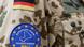 Mali | Ecussion de la mission de formation européenne EUTM sur le bras d'un soldat qui porte l'uniforme allemand Mali | Ecussion de la mission de formation européenne EUTM sur le bras d'un soldat qui porte l'uniforme allemand