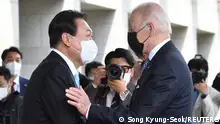 South Korean President Yoon Suk-yeol greets U.S. President Joe Biden prior to a summit meeting at the Presidential Office in Seoul, South Korea May 21, 2022. Song Kyung-Seok/Pool via REUTERS