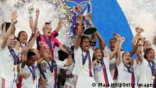 TURIN, ITALY - MAY 21: Wendie Renard of Olympique Lyonnais lifts the UEFA Women's Champions League following victory in the UEFA Women's Champions League final match between FC Barcelona and Olympique Lyonnais at Juventus Stadium on May 21, 2022 in Turin, Italy. (Photo by Maja Hitij/Getty Images)