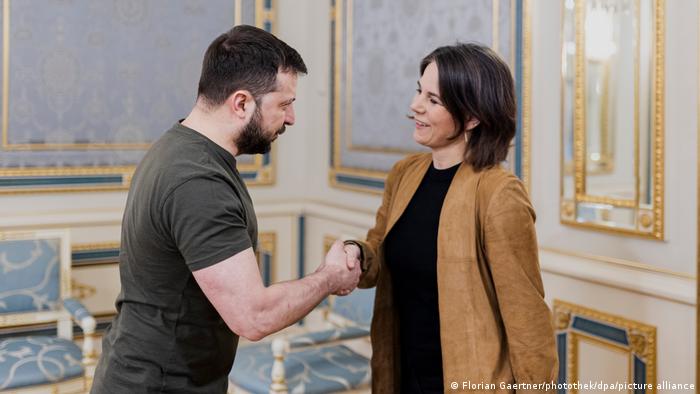 President of Ukraine Volodymyr Zelenskyy shakes hands with Minister of Foreign Affairs Annalena Berbok
