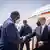 German Chancellor Olaf Scholz is greeted by Senegalese President Macky Sall at Dakar airport
