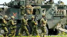 Canadian troops of NATO enhanced Forward Presence battlegroup run during Namejs 2022 military exercise near Strenci, Latvia May 22, 2022. REUTERS/Ints Kalnins