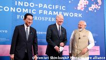 (L-R) Japanese Prime Minister Fumio Kishida, U.S. President Joe Biden and Indian Prime Minister Narendra Modi attend a starting event for IPEF, Indo-Pacific Economic Framework, in Tokyo on May 23, 2022.( The Yomiuri Shimbun via AP Images )