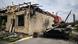 A destroyed Russian tank in the yard of a private house in Hostomel, A destroyed Russian tank in the yard of a private house in Hostomel,