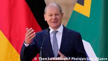 German Chancellor Olaf Scholz speaks during a joint media conference with South Africa President Cyril Ramaphosa at the Union Building in Pretoria, South Africa, Tuesday, May 24, 2022. (AP Photo/Themba Hadebe)