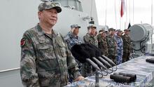FILE - In this April 12, 2018, file photo released by Xinhua News Agency, Chinese President Xi Jinping speaks after reviewing the Chinese People's Liberation Army (PLA) Navy fleet in the South China Sea. A new Pentagon report lays out U.S. concerns about China's growing military might, underscoring worries about a possible attack against Taiwan. The report's release on Jan. 15, 2019 came just a week after Chinese President Xi Jinping called on his People's Liberation Army to better prepare for combat. (Li Gang/Xinhua via AP, File)