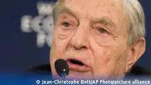 George Soros, chairman of Soros Fund Management, speaks during a press conference on the first day of the 43rd Annual Meeting of the World Economic Forum, WEF, in Davos, Switzerland, Wednesday, Jan. 23, 2013. ( AP Photo/Keystone/Jean-Christophe Bott)