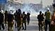 Policemen fire tear gas shells towards supporters of Pakistan's former prime minister Imran Khan during a protest rally in Rawalpindi Policemen fire tear gas shells towards supporters of Pakistan's former prime minister Imran Khan during a protest rally in Rawalpindi