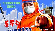 A poster depicts a disinfection worker in North Korea in this undated image released May 23, 2022 by the country's Korean Central News Agency. KCNA via REUTERS ATTENTION EDITORS - THIS IMAGE WAS PROVIDED BY A THIRD PARTY. REUTERS IS UNABLE TO INDEPENDENTLY VERIFY THIS IMAGE. NO THIRD PARTY SALES. SOUTH KOREA OUT. NO COMMERCIAL OR EDITORIAL SALES IN SOUTH KOREA.