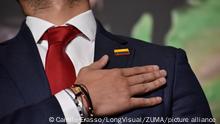 May 26, 2022, Bogota, Cundinamarca, Colombia: A person signs Colombian national anthem with their hand close to a Colombian flag during the international verification missions meeting for the 2022 presidential elections in Colombia that will take place on May 29. In Bogota, Colombia, May 26, 2022. Photo by: Camilo Erasso/Long Visual Press (Credit Image: Â© Camilo Erasso/LongVisual via ZUMA Press Wire