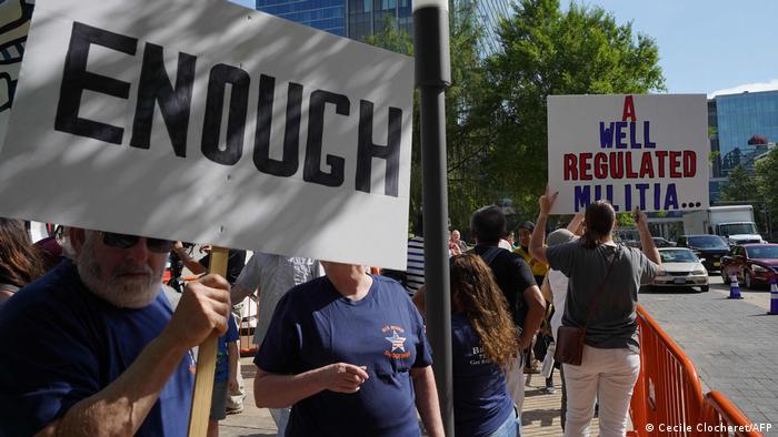 Gun rights activists protest outside of the National Rifle Association Annual Meeting