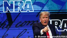 Former U.S. President Donald Trump gestures during the National Rifle Association (NRA) annual convention in Houston, Texas, U.S. May 27, 2022. REUTERS/Shannon Stapleton