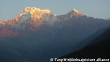 (201112) -- POKHARA, Nov. 12, 2020 (Xinhua) -- Photo shows the scenery of Annapurna ranges in Nepal on Nov. 9, 2020. (Photo by Tang Wei/Xinhua)