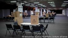 Workers of Colombia's national registry prepare the Corferias fair compund for the 2022 Presidential Elections in Colombia that will take place on May 29, in Bogota, Colombia May 28, 2022. (Photo by Sebastian Barros/NurPhoto)
