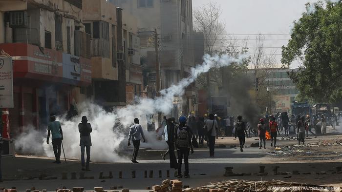 Sudanese security forces use tear gas on demonstrators in Khartoum on May 26, 2022 