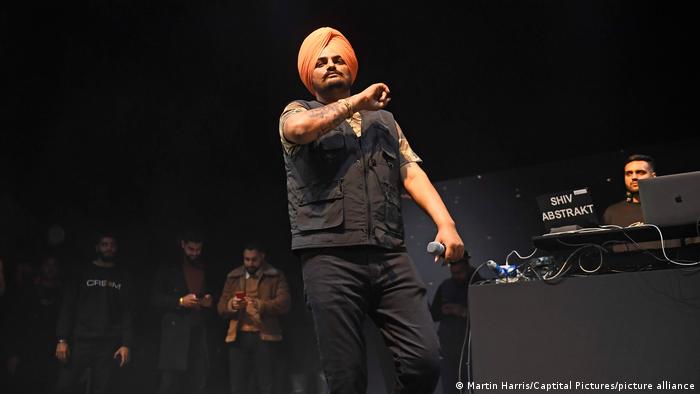 Indian rapper Sidhu Moose Wala performing on stage.